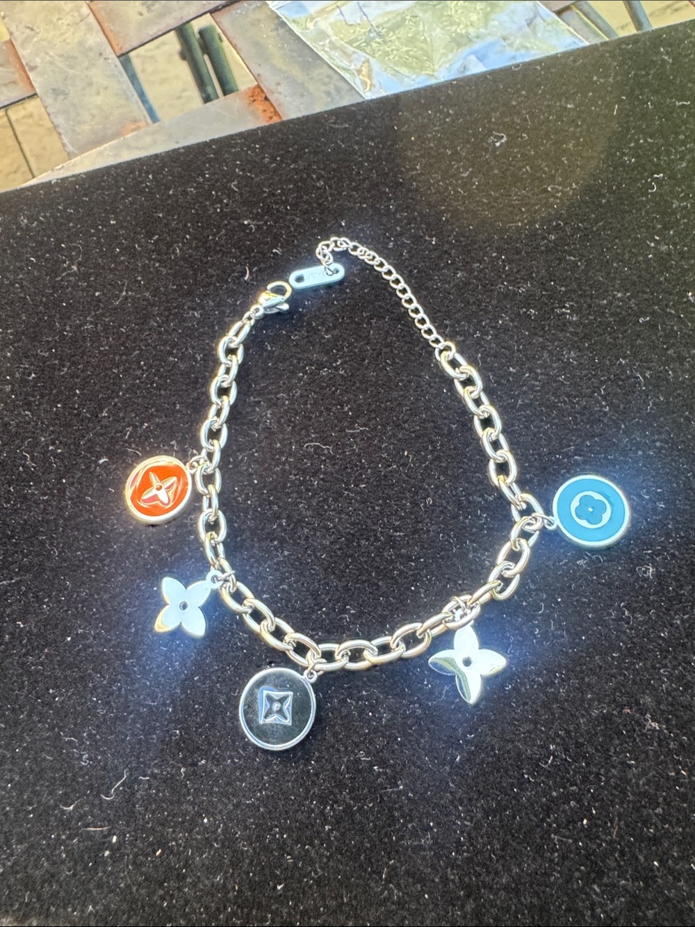 Silver Charm Bracelet with Orange and Blue Enamel Charms
